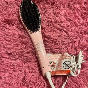 pink straightener brush 🪮